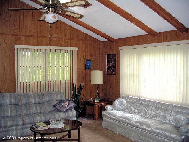 0 Spring Hill Road Sterling, PA 18463 - Photo 23 of 24 a living room with furniture and a window