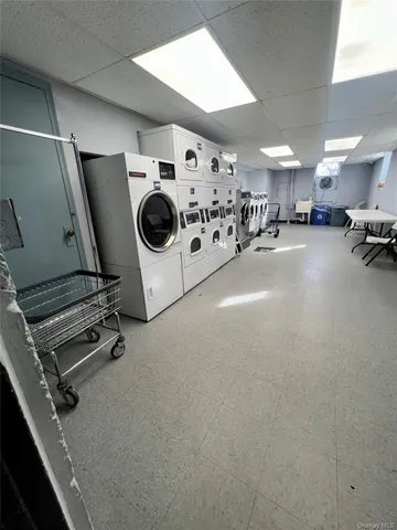 a room with gym equipment and a large window