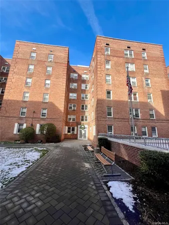 a view of a building and a yard