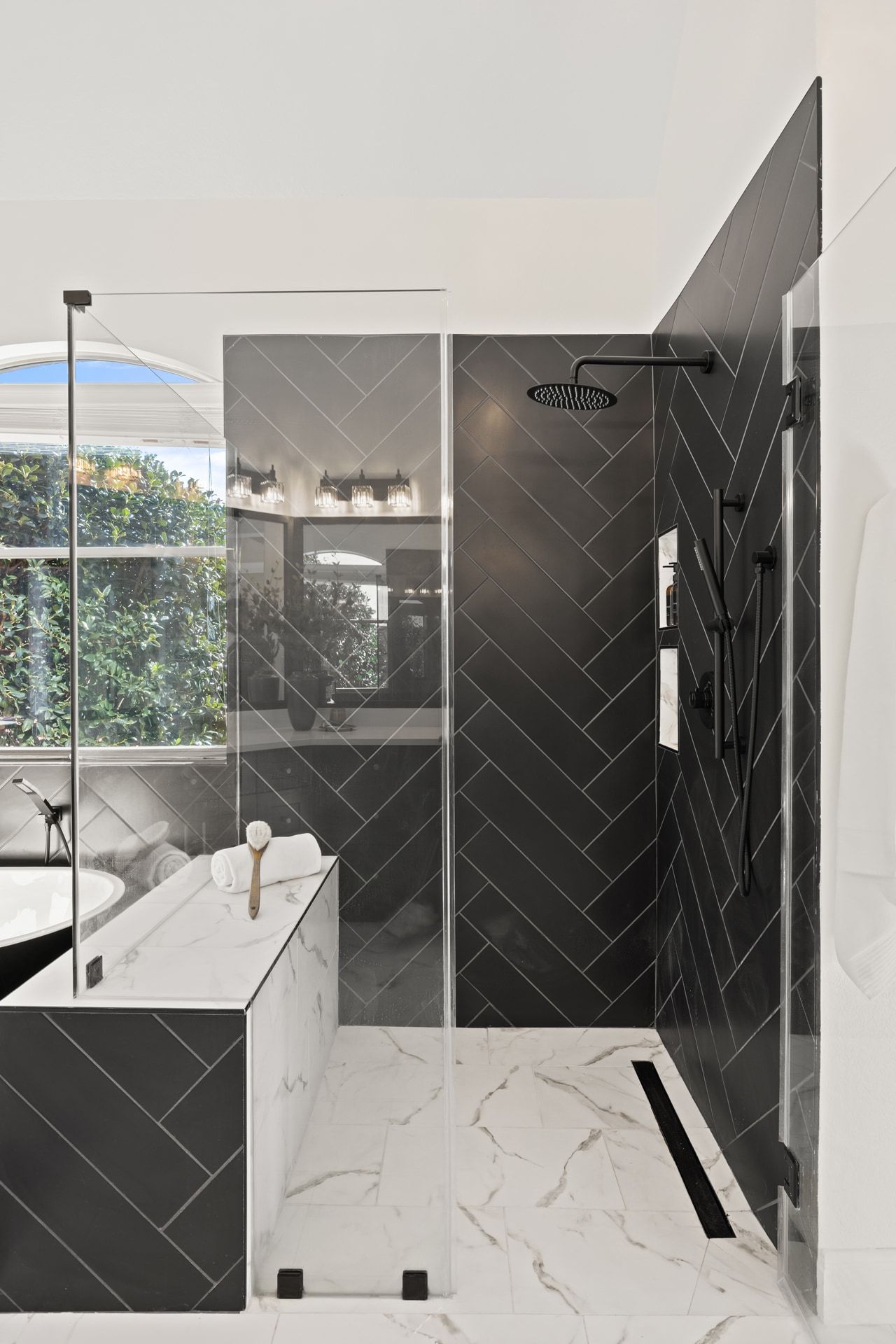 2702 Lakehurst Road Spicewood, TX 78669 - Photo 26 of 40 a bathroom with a sink and mirror