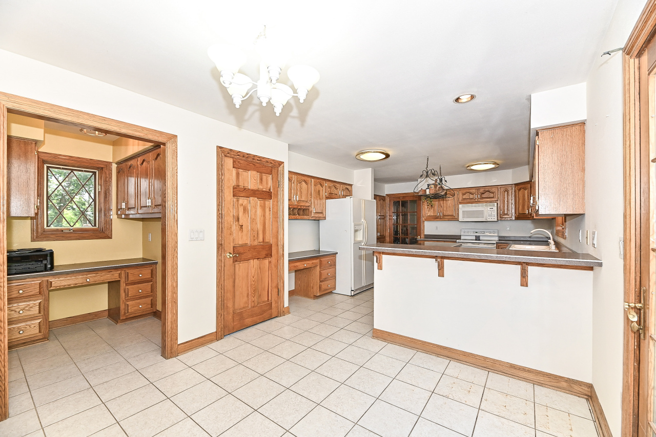 N7450 Carriage Drive Troy, WI 53121 - Photo 27 of 46 Large Pantry in Kitchen