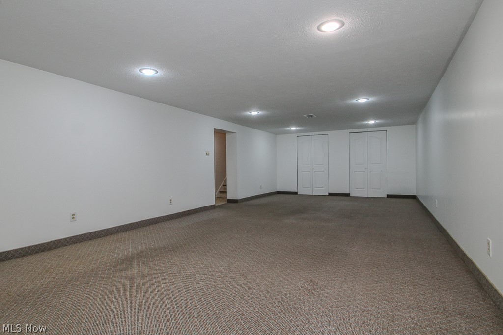 30224 Regent Road Wickliffe, OH 44092 - Photo 20 of 27 Finished below grade area featuring carpet and recessed lighting