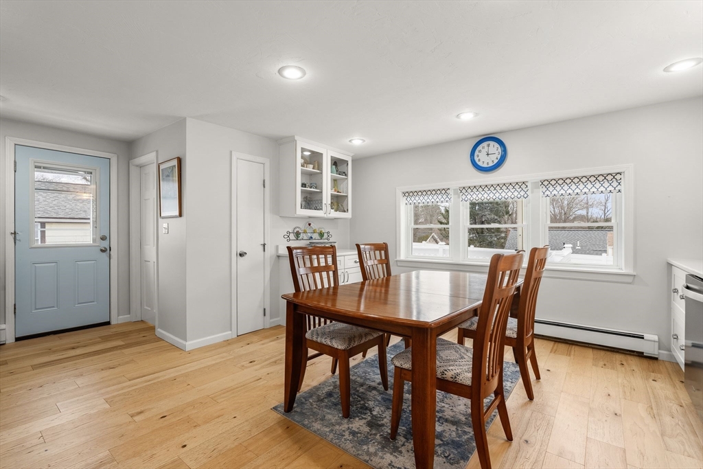 19 Overlook Road Holbrook, MA 02343 - Photo 12 of 42 a view of a dining room with furniture and wooden floor