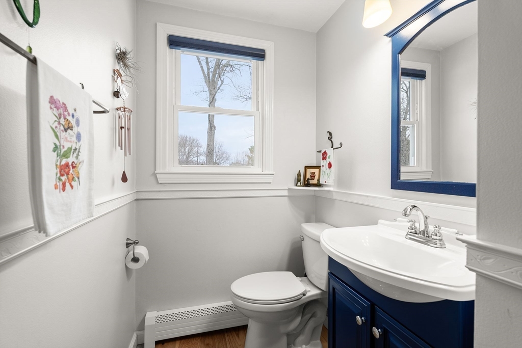 19 Overlook Road Holbrook, MA 02343 - Photo 17 of 42 a bathroom with a sink toilet and a window