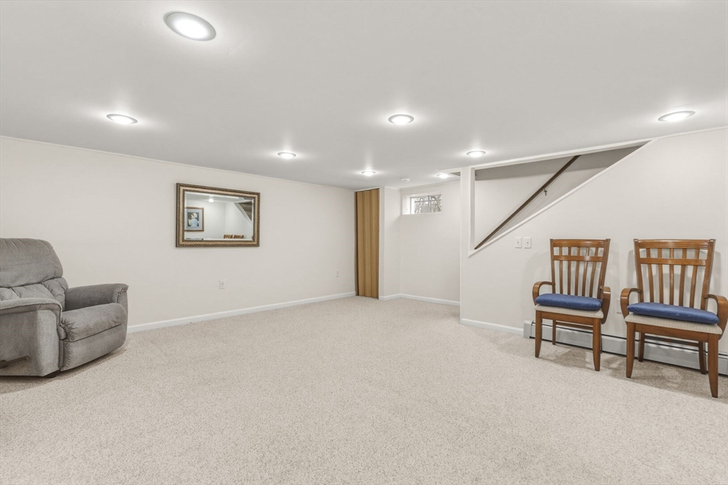 19 Overlook Road Holbrook, MA 02343 - Photo 32 of 42 a view of an empty room with a painting on the wall