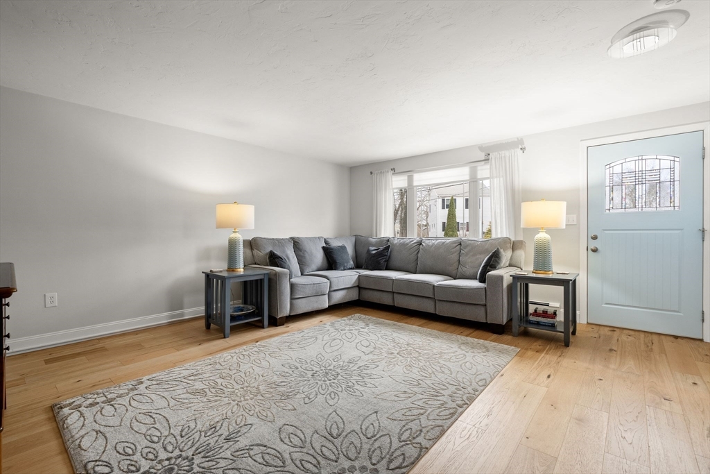 19 Overlook Road Holbrook, MA 02343 - Photo 5 of 42 a living room with furniture and a couch