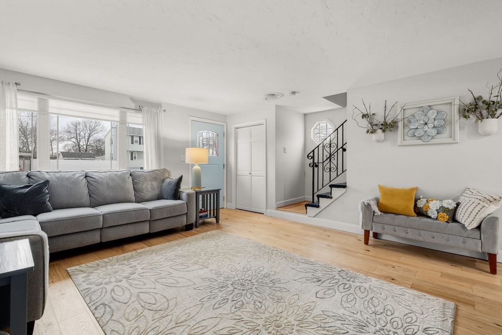 19 Overlook Road Holbrook, MA 02343 - Photo 6 of 42 a living room with furniture and a rug