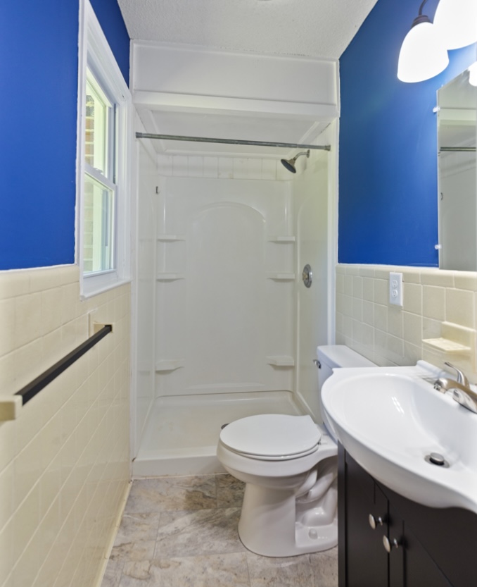 104 Doyle Drive Seneca, SC 29678 - Photo 13 of 19 Functional bathroom with shower and vanity, offering essential amenities for daily routines.