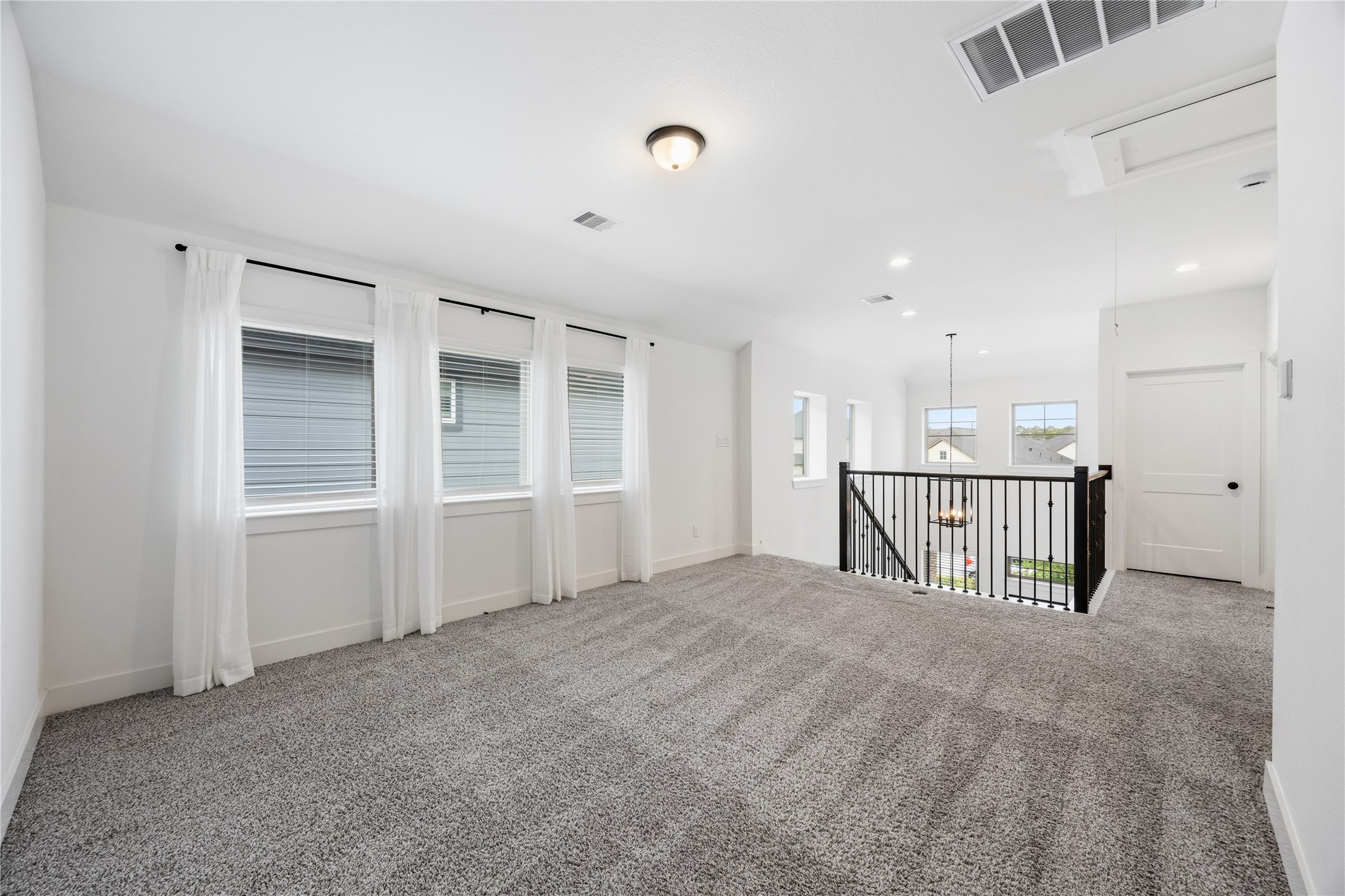 10636 Wild Chives Conroe, TX 77385 - Photo 19 of 29 a view of a hallway with closet area