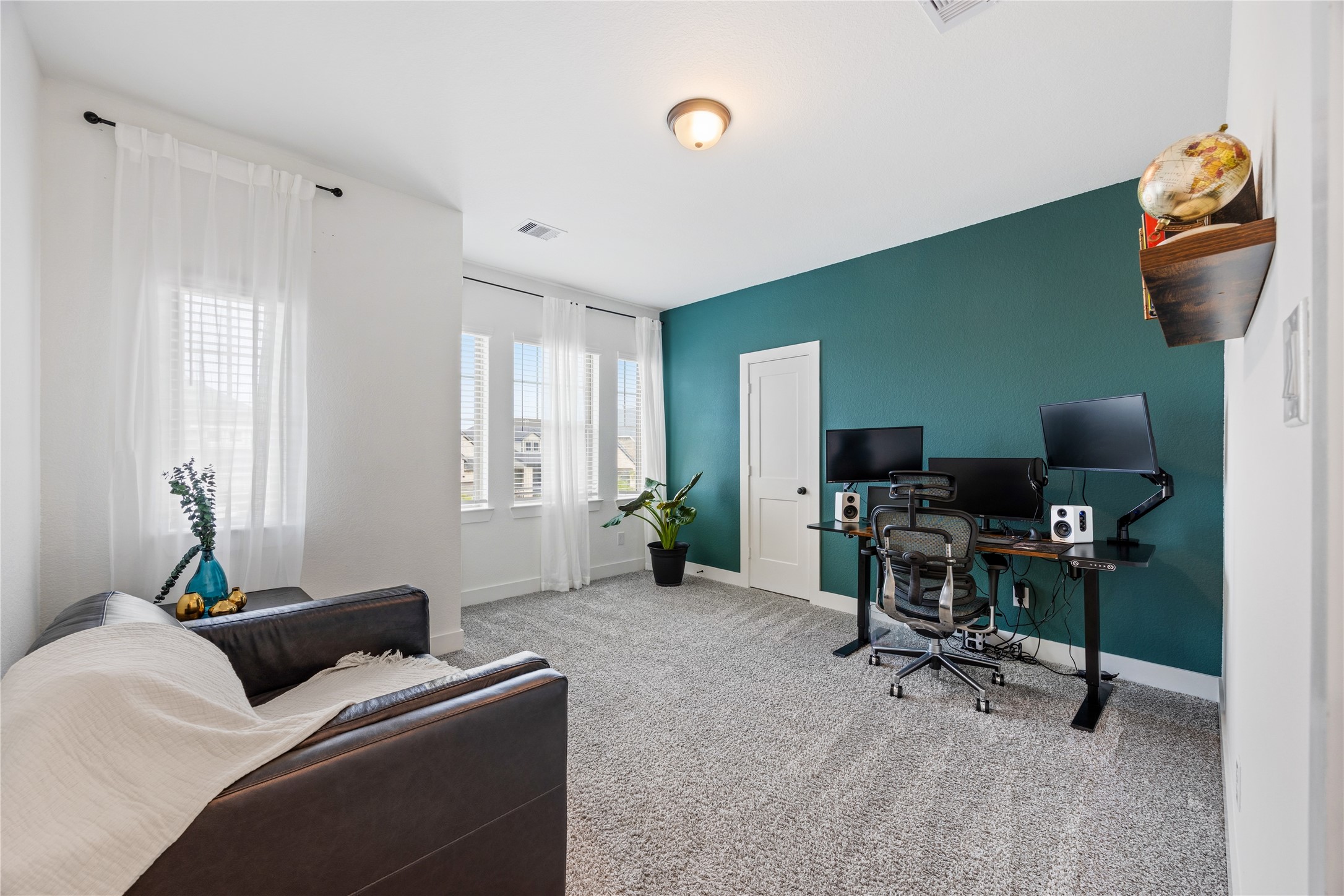 10636 Wild Chives Conroe, TX 77385 - Photo 20 of 29 a living room with furniture and a window