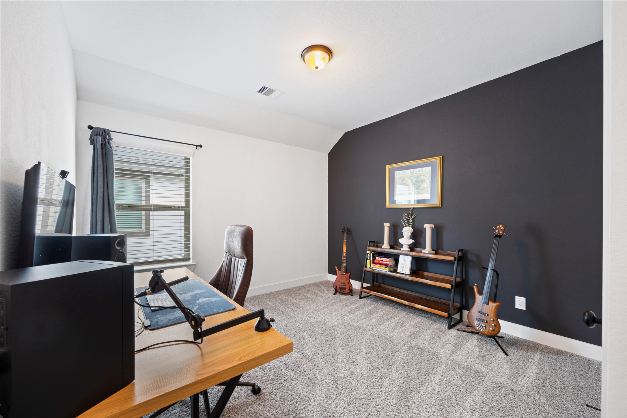 10636 Wild Chives Conroe, TX 77385 - Photo 23 of 29 a view of a workspace with furniture and a window