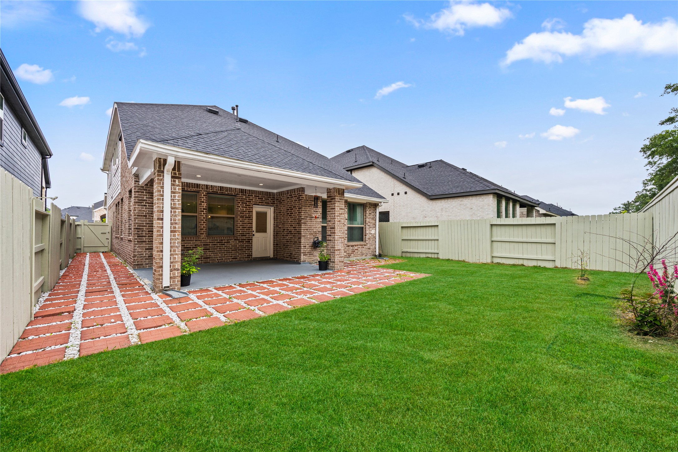 10636 Wild Chives Conroe, TX 77385 - Photo 26 of 29 a view of a house with a yard