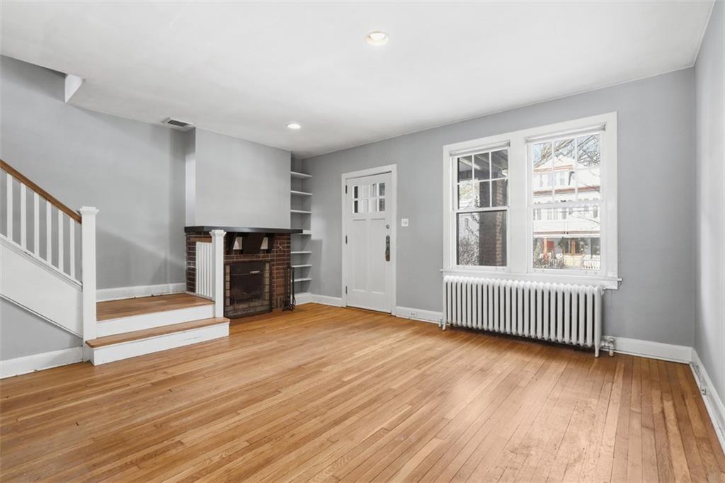 5928 Kentucky Avenue Pittsburgh, PA 15232 - Photo 12 of 40 a view of livingroom with hardwood floor and a ceiling fan