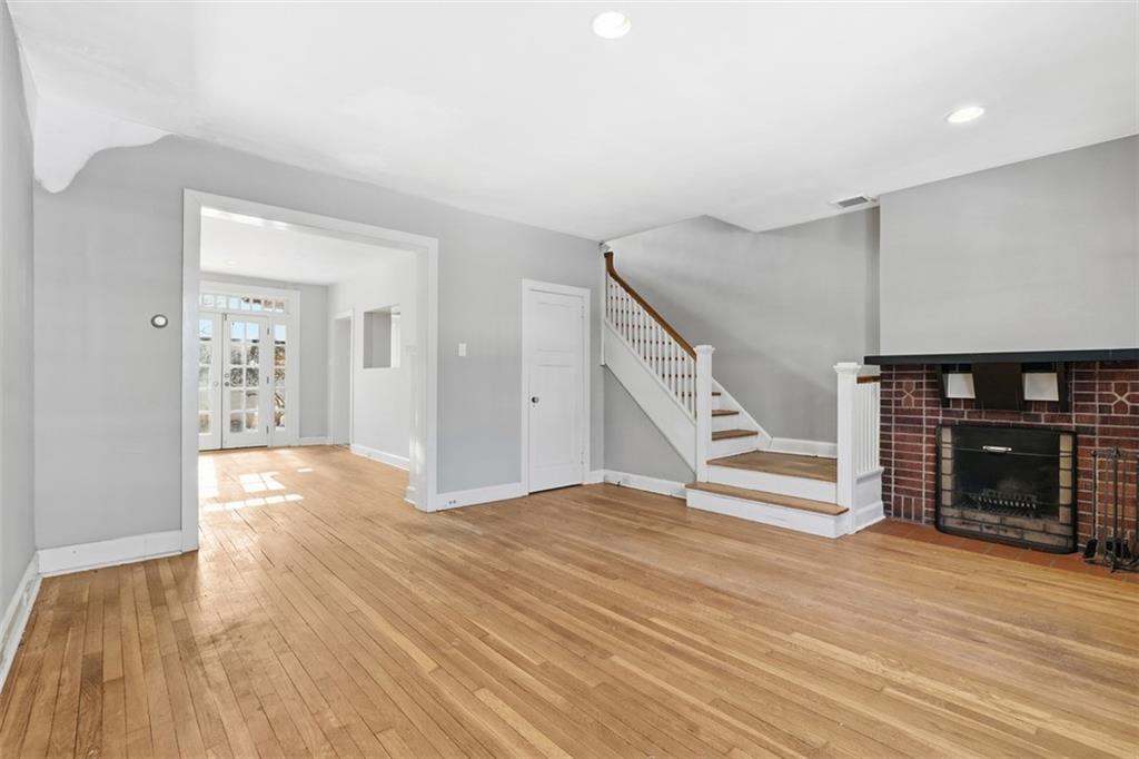 5928 Kentucky Avenue Pittsburgh, PA 15232 - Photo 13 of 40 a view of empty room with wooden floor and fan