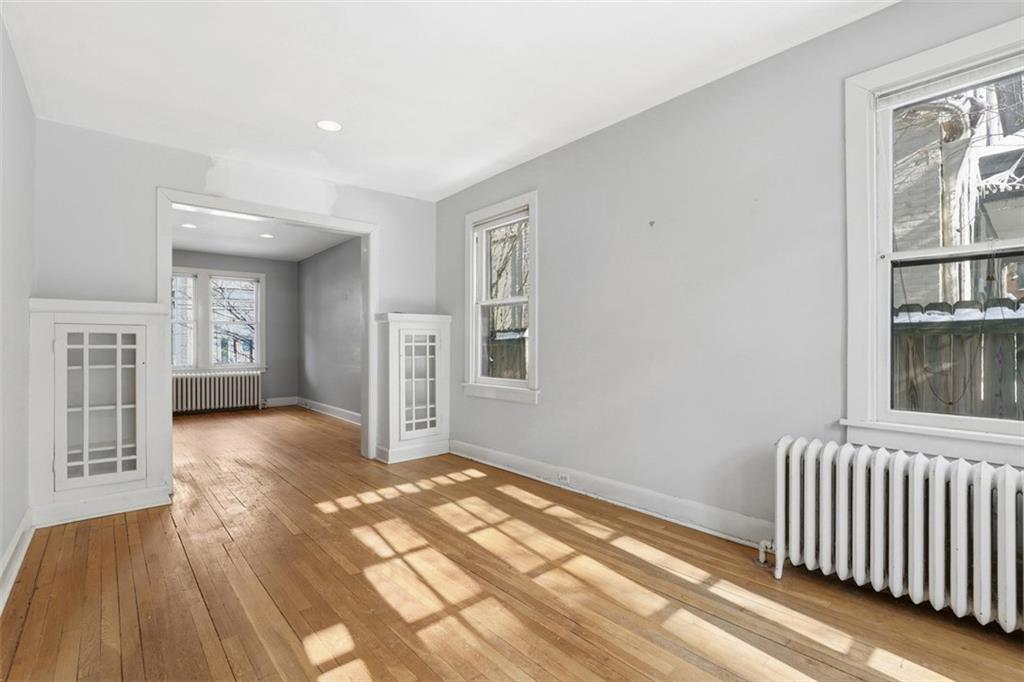 5928 Kentucky Avenue Pittsburgh, PA 15232 - Photo 16 of 40 a view of livingroom with hardwood floor and window
