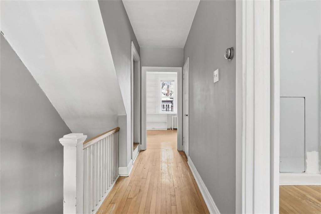 5928 Kentucky Avenue Pittsburgh, PA 15232 - Photo 21 of 40 a view of a hallway with wooden floor