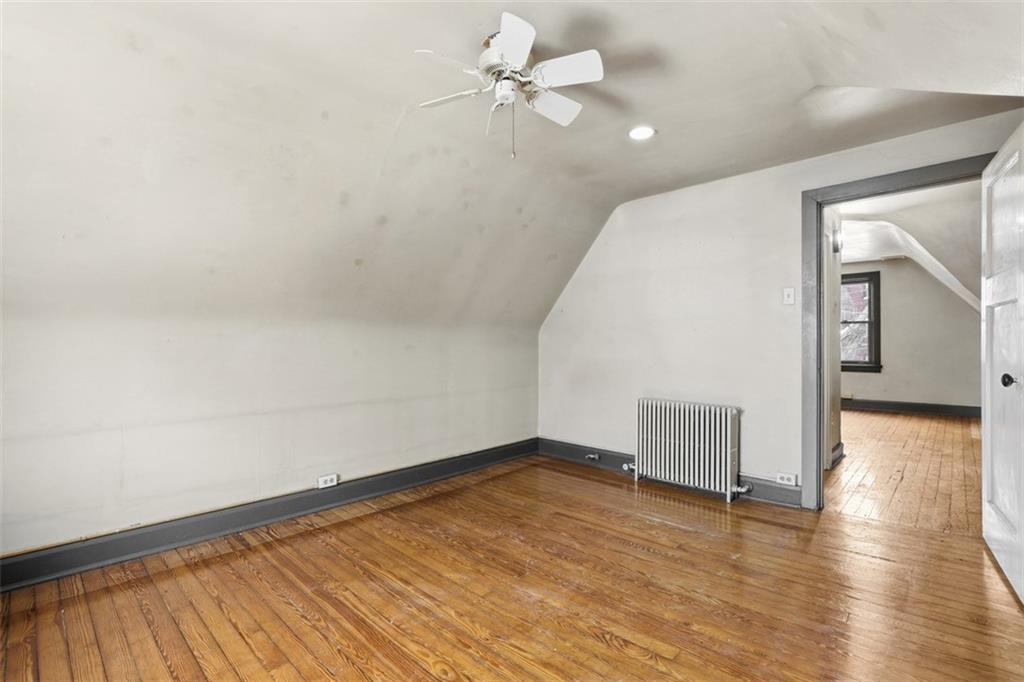 5928 Kentucky Avenue Pittsburgh, PA 15232 - Photo 31 of 40 wooden floor in an empty room with a window