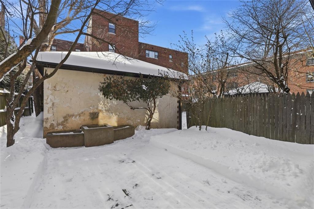 5928 Kentucky Avenue Pittsburgh, PA 15232 - Photo 36 of 40 a backyard of a house with a tree