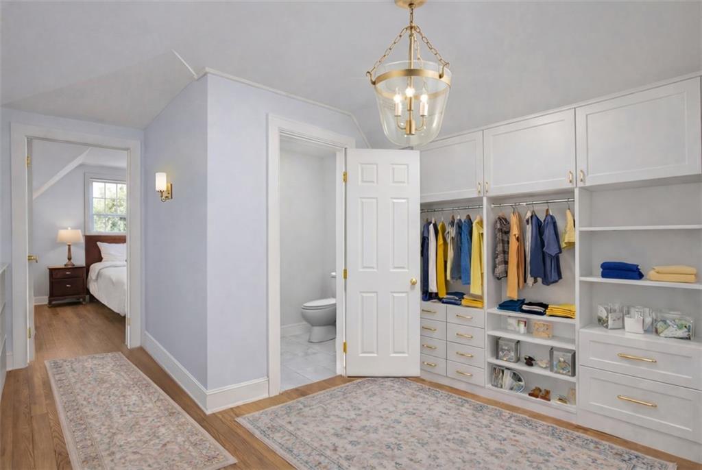 5928 Kentucky Avenue Pittsburgh, PA 15232 - Photo 4 of 40 a view of walk in closet with clothes and shoes