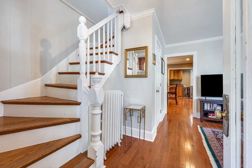 98 Reed Street Cambridge, MA 02140 - Photo 18 of 32 a view of a livingroom with wooden floor and furniture