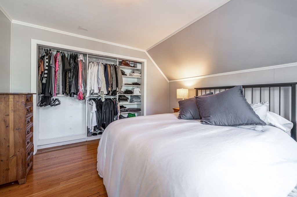 98 Reed Street Cambridge, MA 02140 - Photo 21 of 32 a bedroom with a bed and a closet