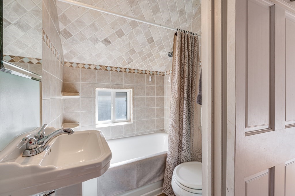 98 Reed Street Cambridge, MA 02140 - Photo 22 of 32 a bathroom with a sink toilet and shower