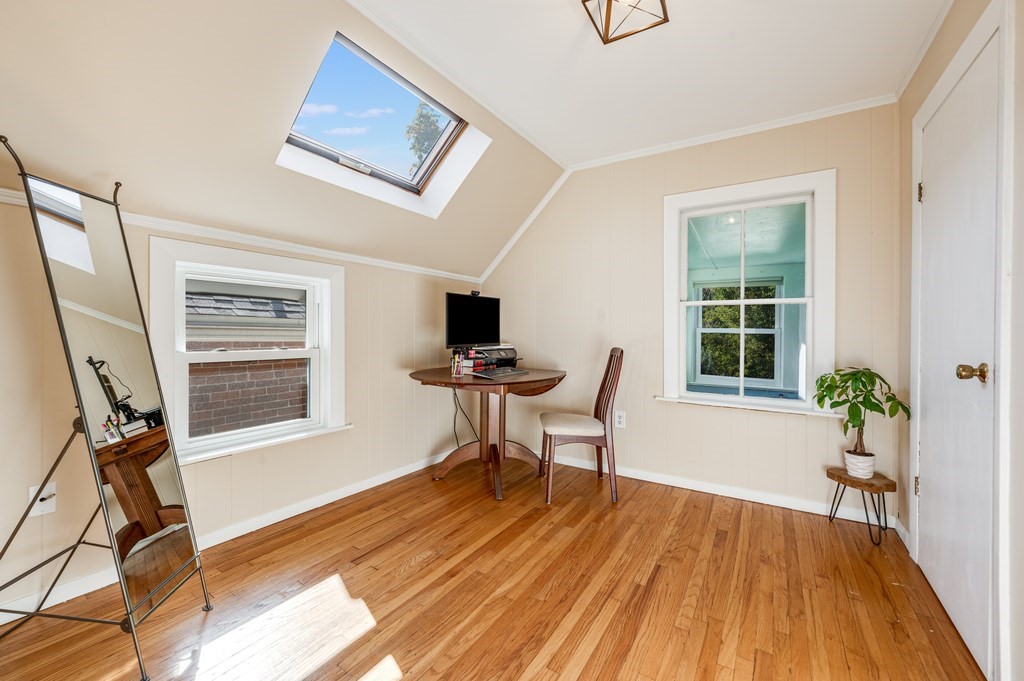 98 Reed Street Cambridge, MA 02140 - Photo 26 of 32 a work room with furniture and wooden floor