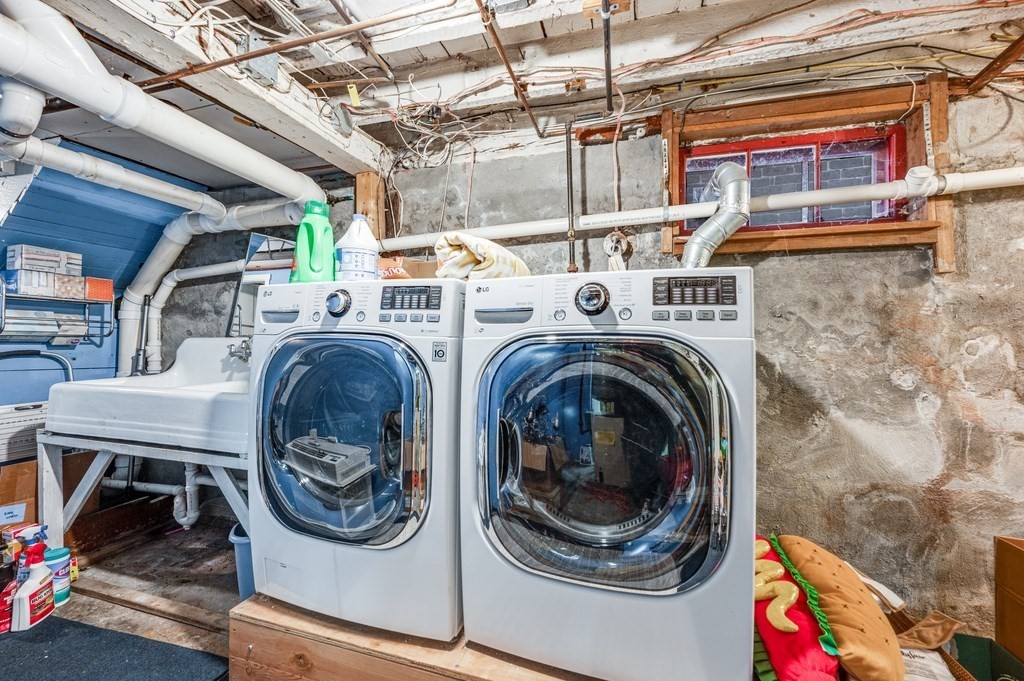 98 Reed Street Cambridge, MA 02140 - Photo 27 of 32 a utility room with dryer and washer
