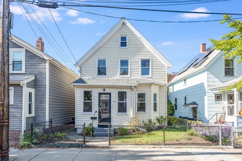98 Reed Street Cambridge, MA 02140 - Photo 31 of 32 a front view of a house with a yard