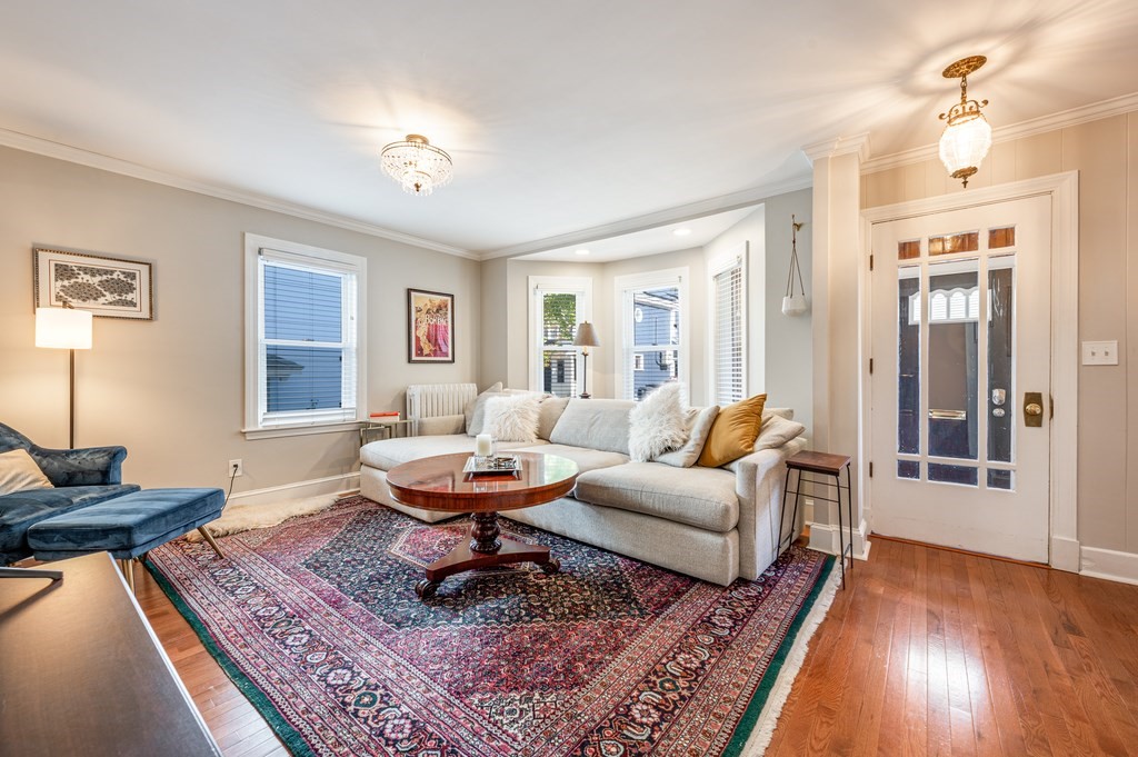 98 Reed Street Cambridge, MA 02140 - Photo 4 of 32 a living room with furniture and a potted plant