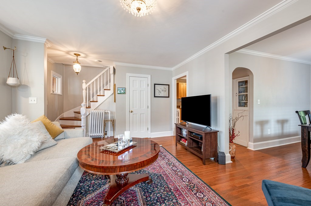 98 Reed Street Cambridge, MA 02140 - Photo 6 of 32 a living room with furniture and a flat screen tv