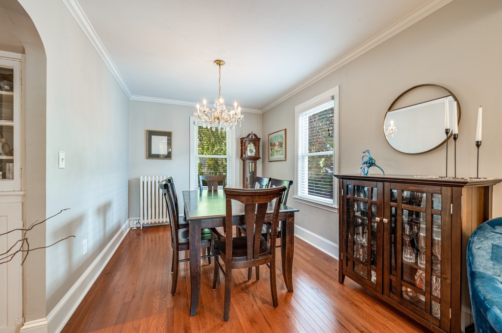 98 Reed Street Cambridge, MA 02140 - Photo 7 of 32 a view of a dining room with furniture window and wooden floor