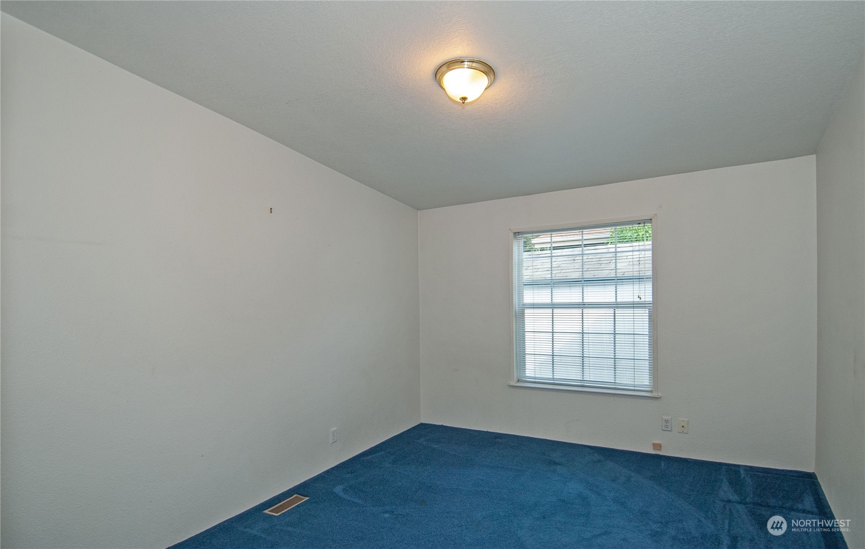 15400 Southeast 155th Place, Unit 12 Renton, WA 98058 - Photo 14 of 21 an empty room with a empty space and a window