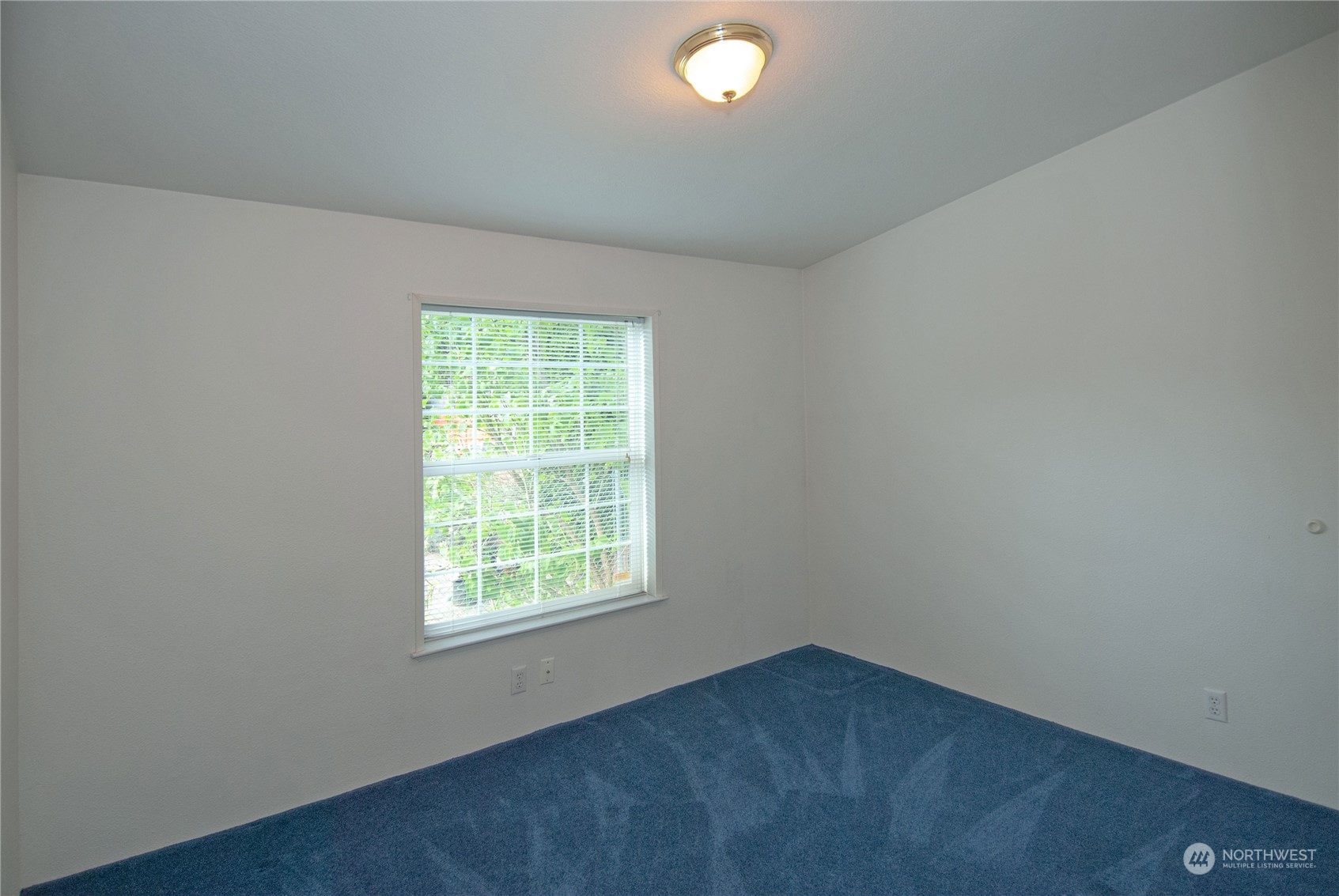 15400 Southeast 155th Place, Unit 12 Renton, WA 98058 - Photo 15 of 21 an empty room with a window