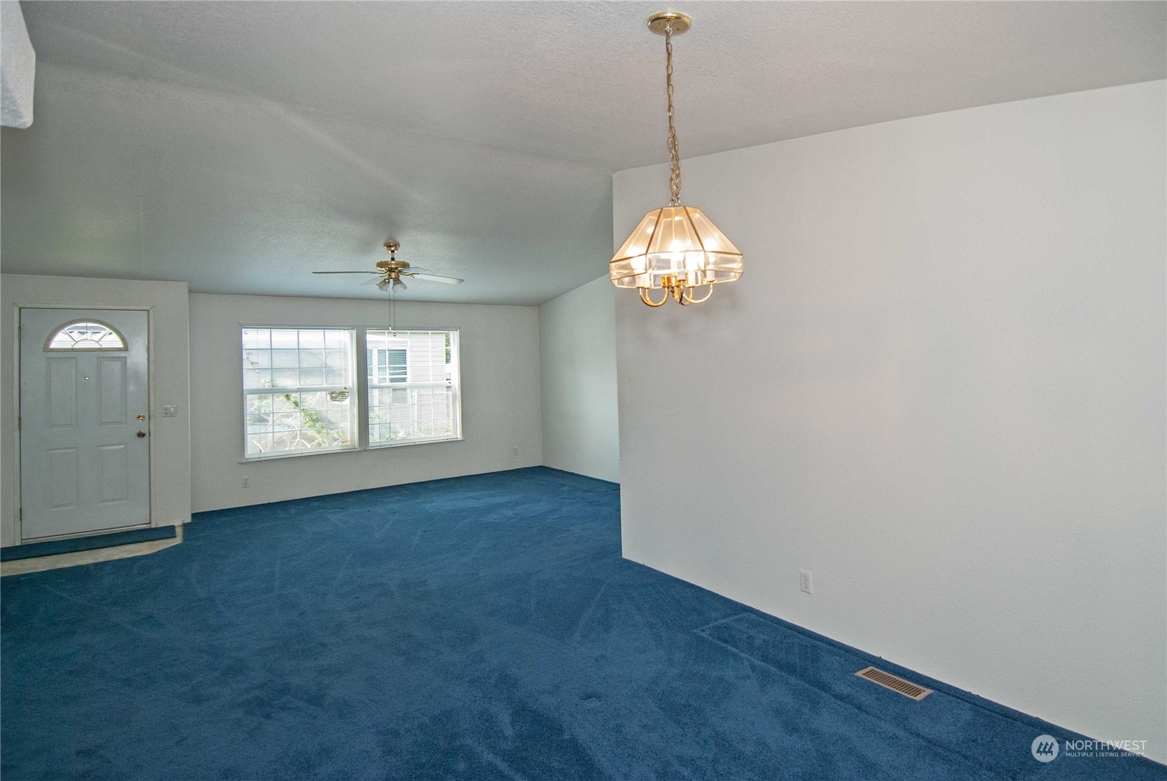 15400 Southeast 155th Place, Unit 12 Renton, WA 98058 - Photo 5 of 21 a view of empty room with window