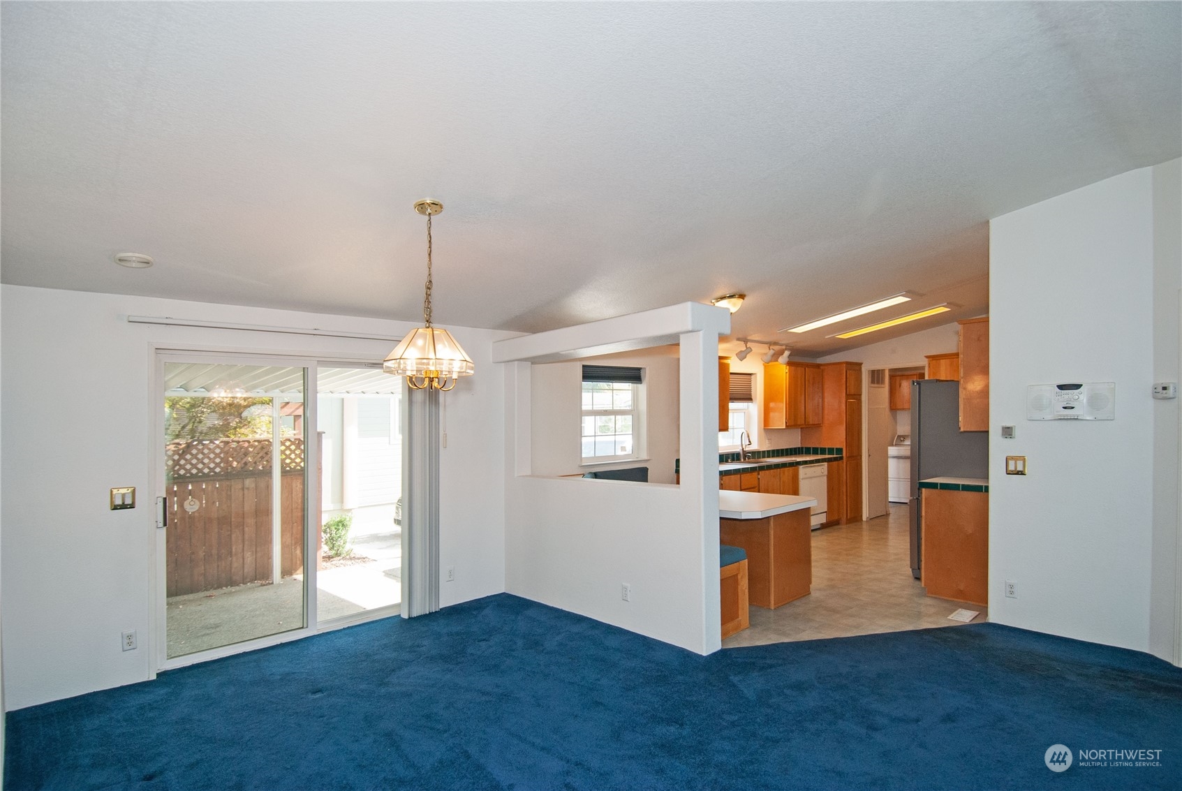 15400 Southeast 155th Place, Unit 12 Renton, WA 98058 - Photo 7 of 21 a view of a kitchen and dining room