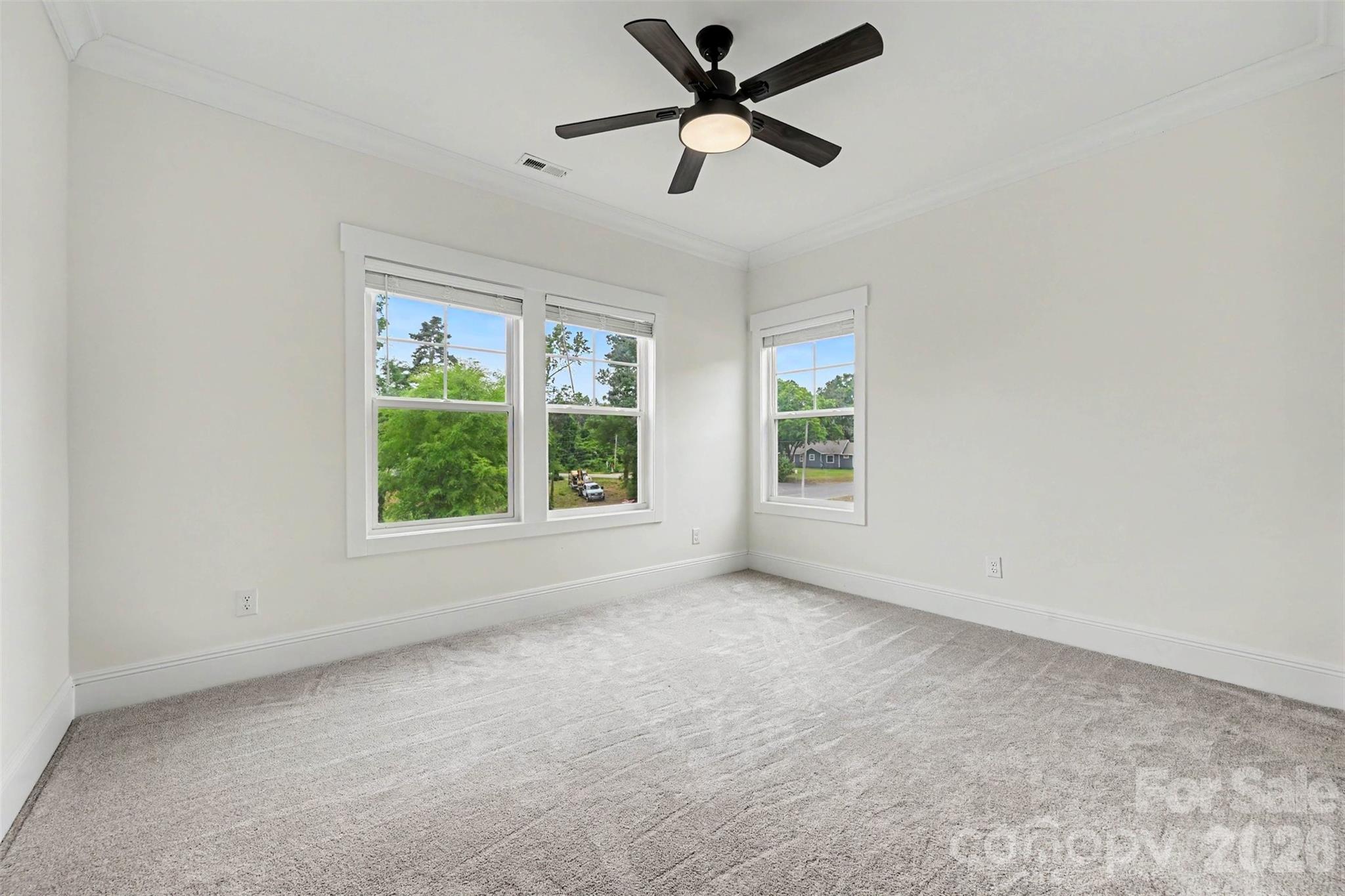 31 Ridgecrest Avenue Peachland, NC 28133 - Photo 29 of 30 an empty room with a window and a fan