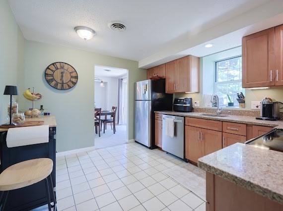 14 Shaw Farm Road, Unit 14 Canton, MA 02021 - Photo 12 of 34 a kitchen with a sink cabinets and wooden floor