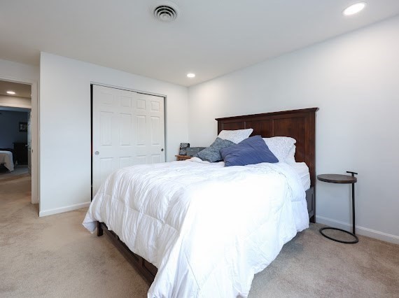 14 Shaw Farm Road, Unit 14 Canton, MA 02021 - Photo 23 of 34 a bedroom with a bed and a night stand