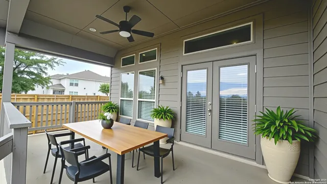 a view of a balcony dining area