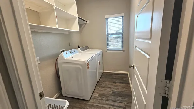 a utility room with dryer and washer