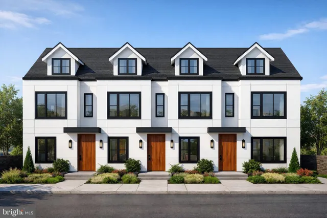a front view of residential houses