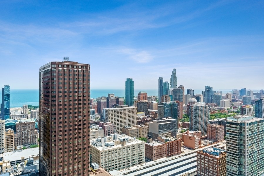 235 West Van Buren Street, Unit 4409 Chicago, IL 60607 - Photo 18 of 26 a picture of city view