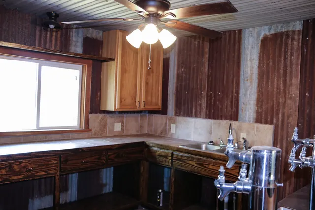 a kitchen with a stove and a microwave