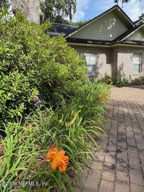 5802 Manning Cemetery Road Jacksonville, FL 32234 - Photo 107 of 117 a backyard of a house with lots of green space
