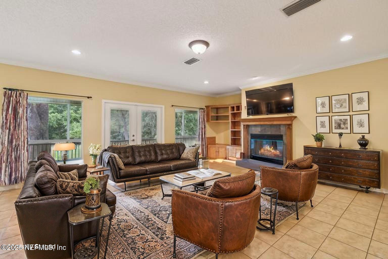 5802 Manning Cemetery Road Jacksonville, FL 32234 - Photo 15 of 117 a living room with furniture and a fireplace
