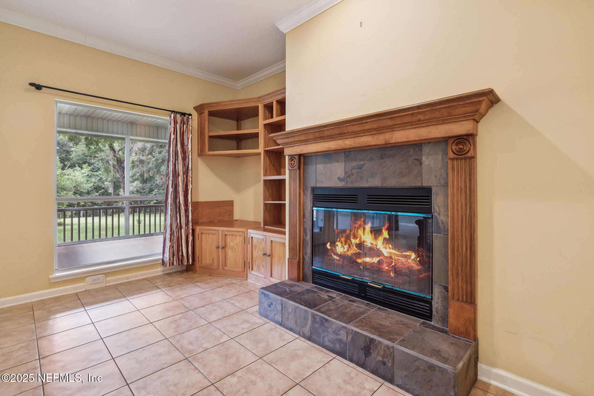 5802 Manning Cemetery Road Jacksonville, FL 32234 - Photo 17 of 117 a living room with furniture and a fireplace