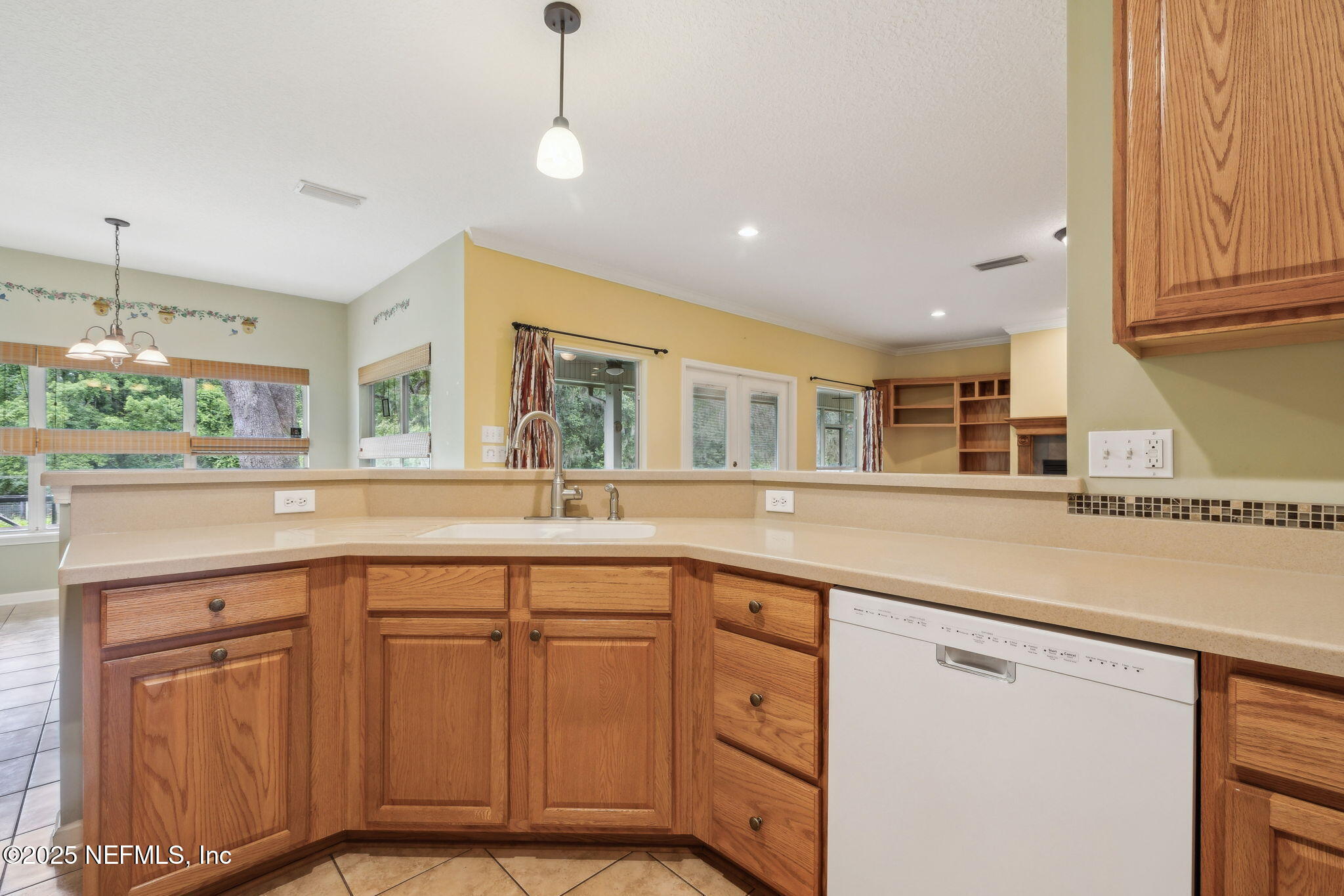 5802 Manning Cemetery Road Jacksonville, FL 32234 - Photo 25 of 117 a kitchen with cabinets and window