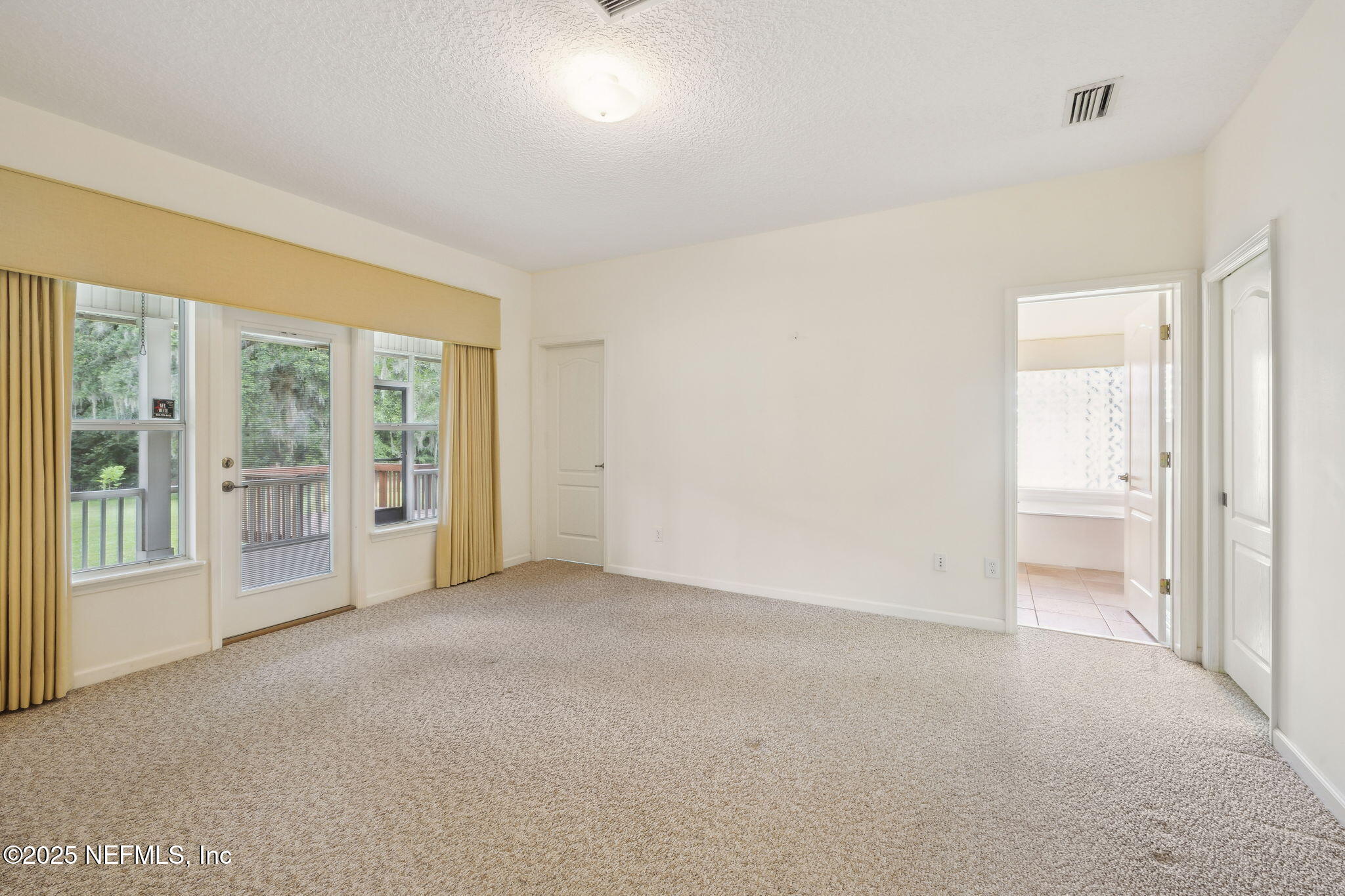 5802 Manning Cemetery Road Jacksonville, FL 32234 - Photo 31 of 117 a view of an empty room with a window