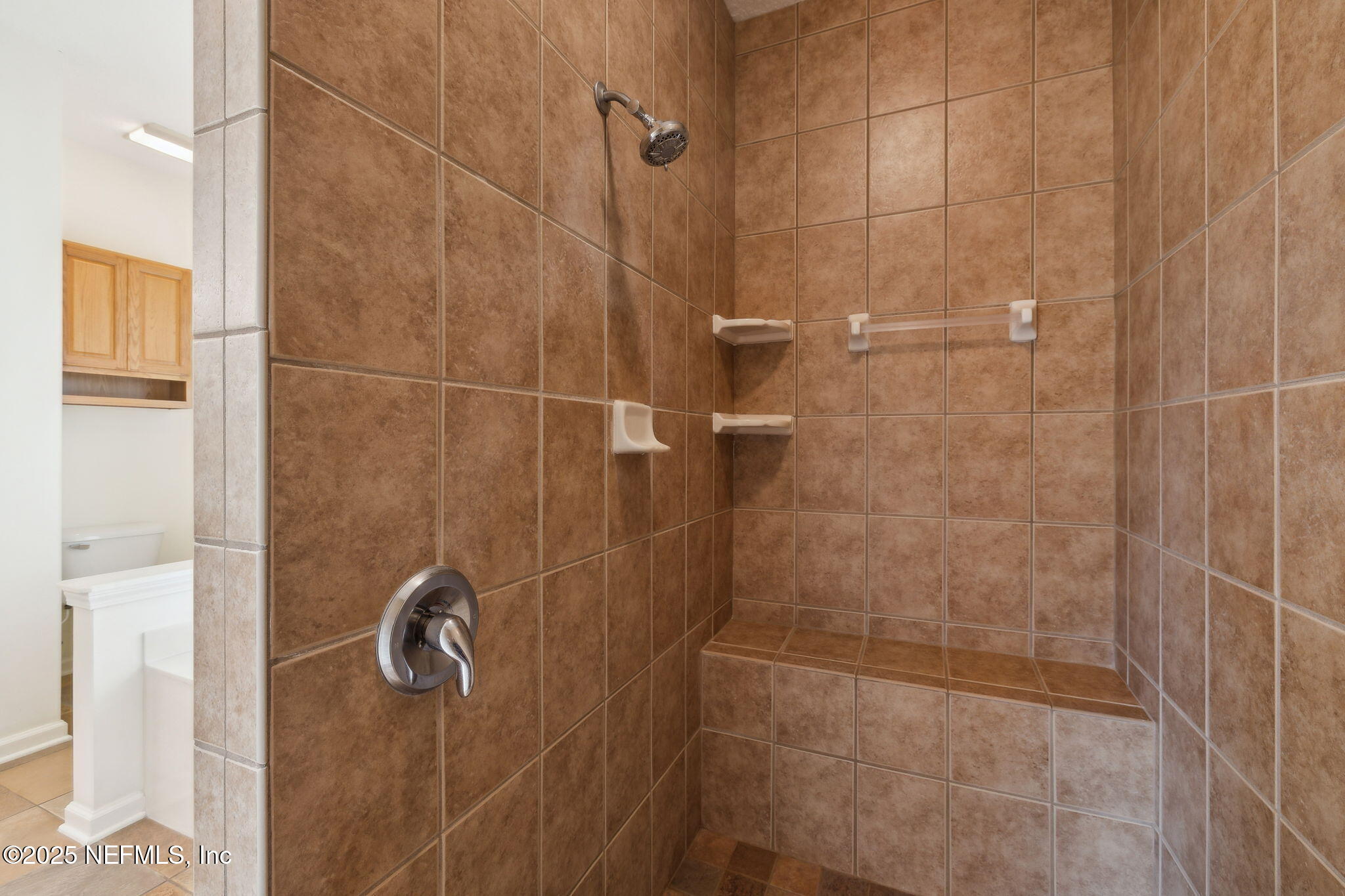 5802 Manning Cemetery Road Jacksonville, FL 32234 - Photo 35 of 117 a bathroom with a shower